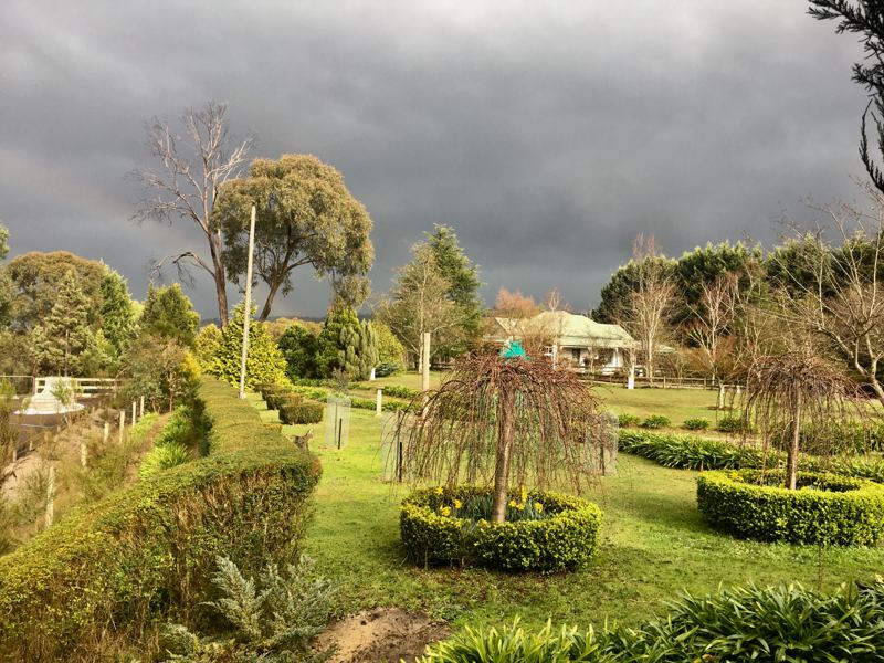 The formal garden under a stormy sky