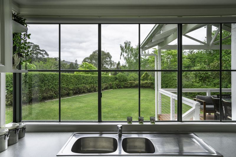 The kitchen sink looking out to the lawn