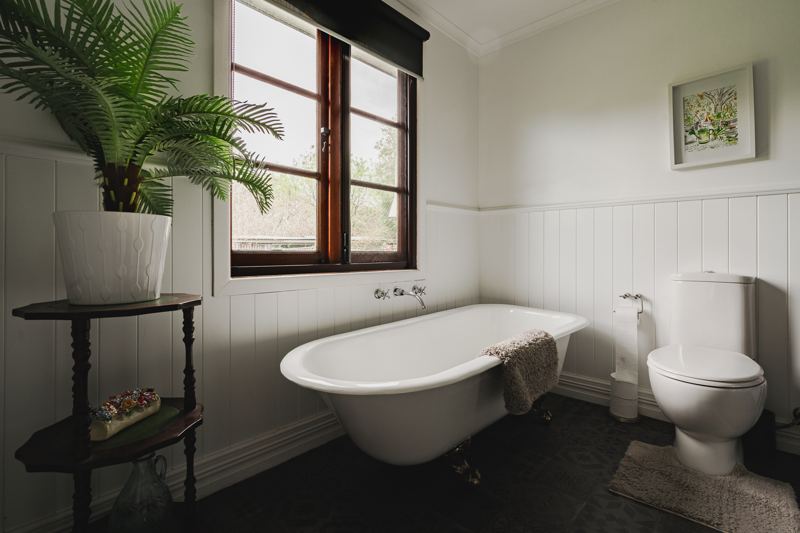 Clawfoot bath in the main bathroom